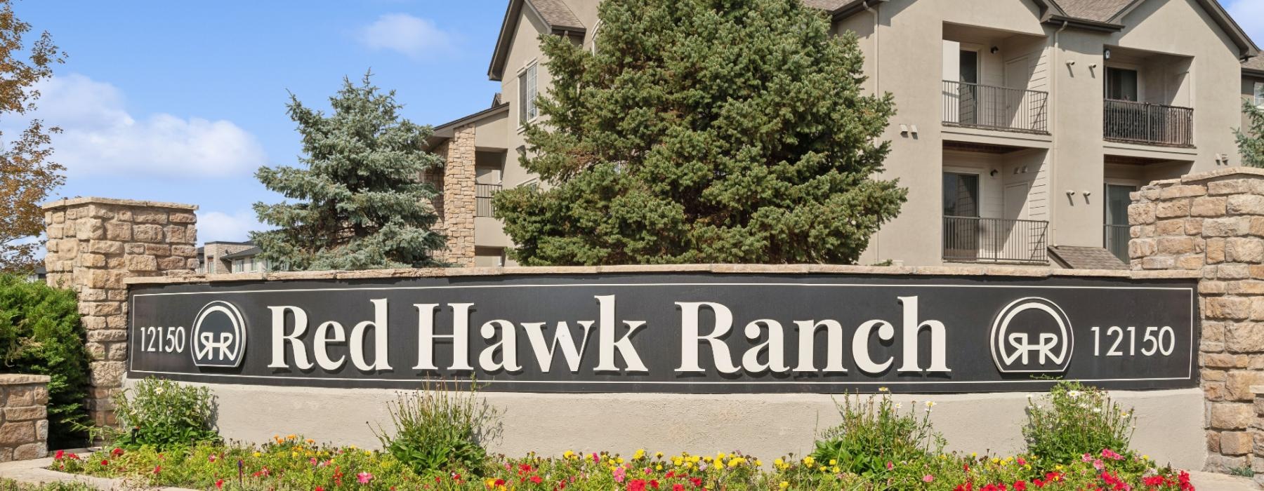 a sign in front of a house