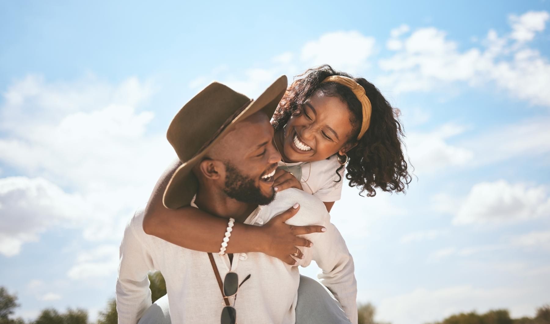 a man holding his daughter