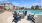 chairs on a deck by a pool