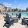 chairs on a deck by a pool